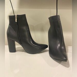 Never worn black booties